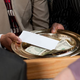 Image for article titled Report: Majority Of Money Donated At Church Doesn't Make It To God